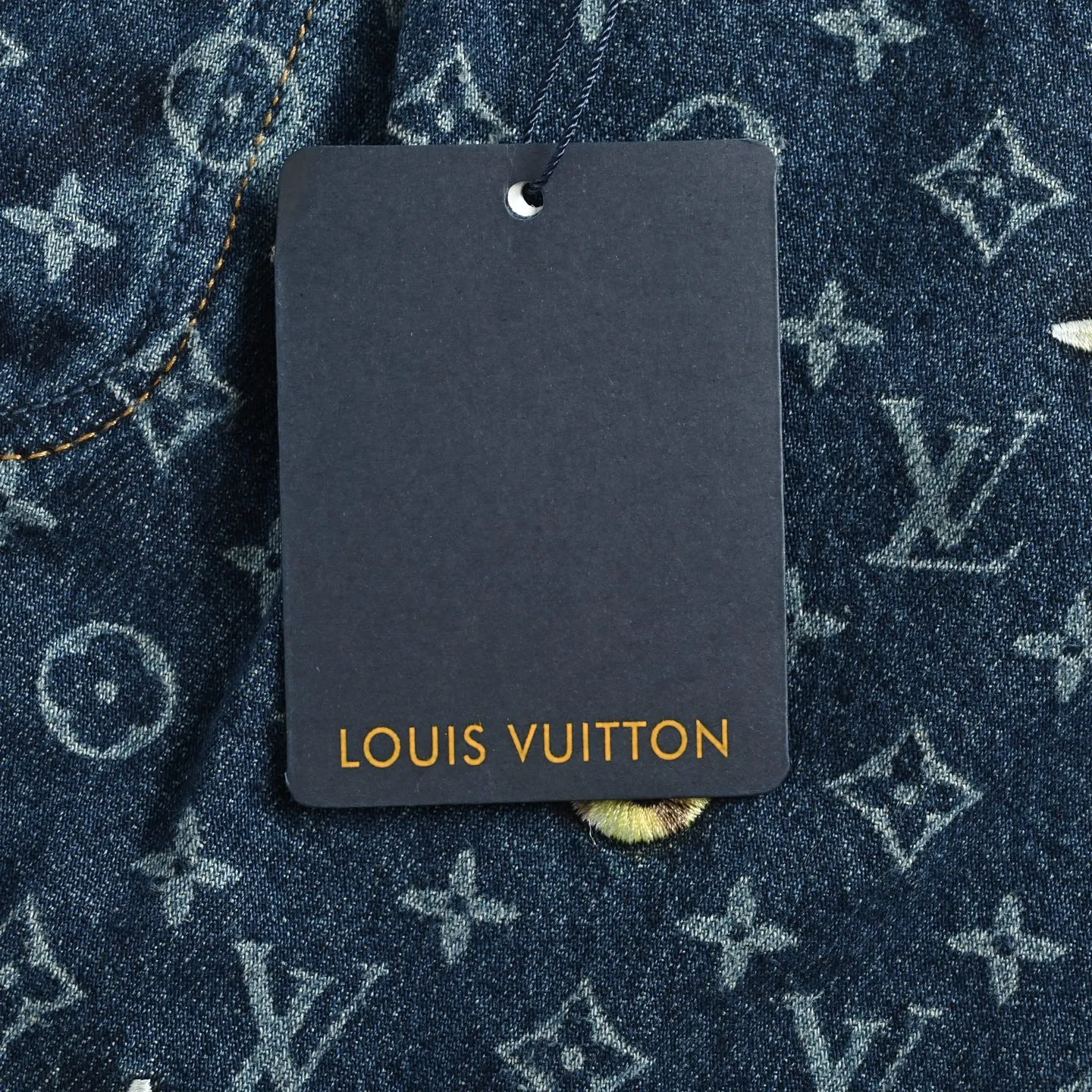 Louis Vuitton/Louis Vuitton all-over logo daisy embroidered jeans